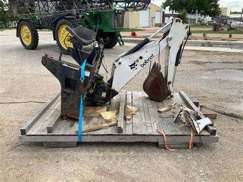 model 709 backhoe attachment for a bobcat skid steer|bobcat 709 backhoe attachment specs.